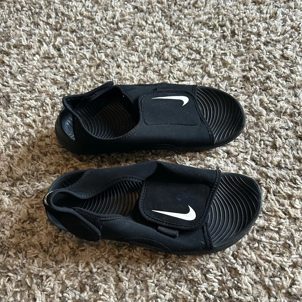 Nike Kids Black Slide Sandals with White Swoosh Accent